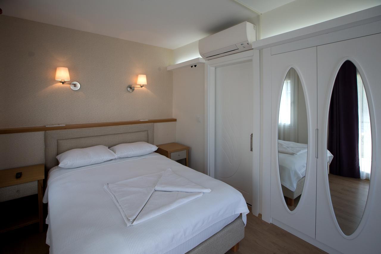 Clementin Suits Siğacık Bagian luar foto
