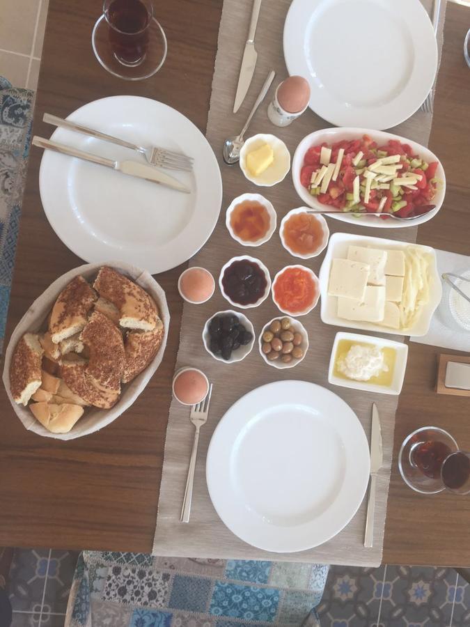 Clementin Suits Siğacık Bagian luar foto